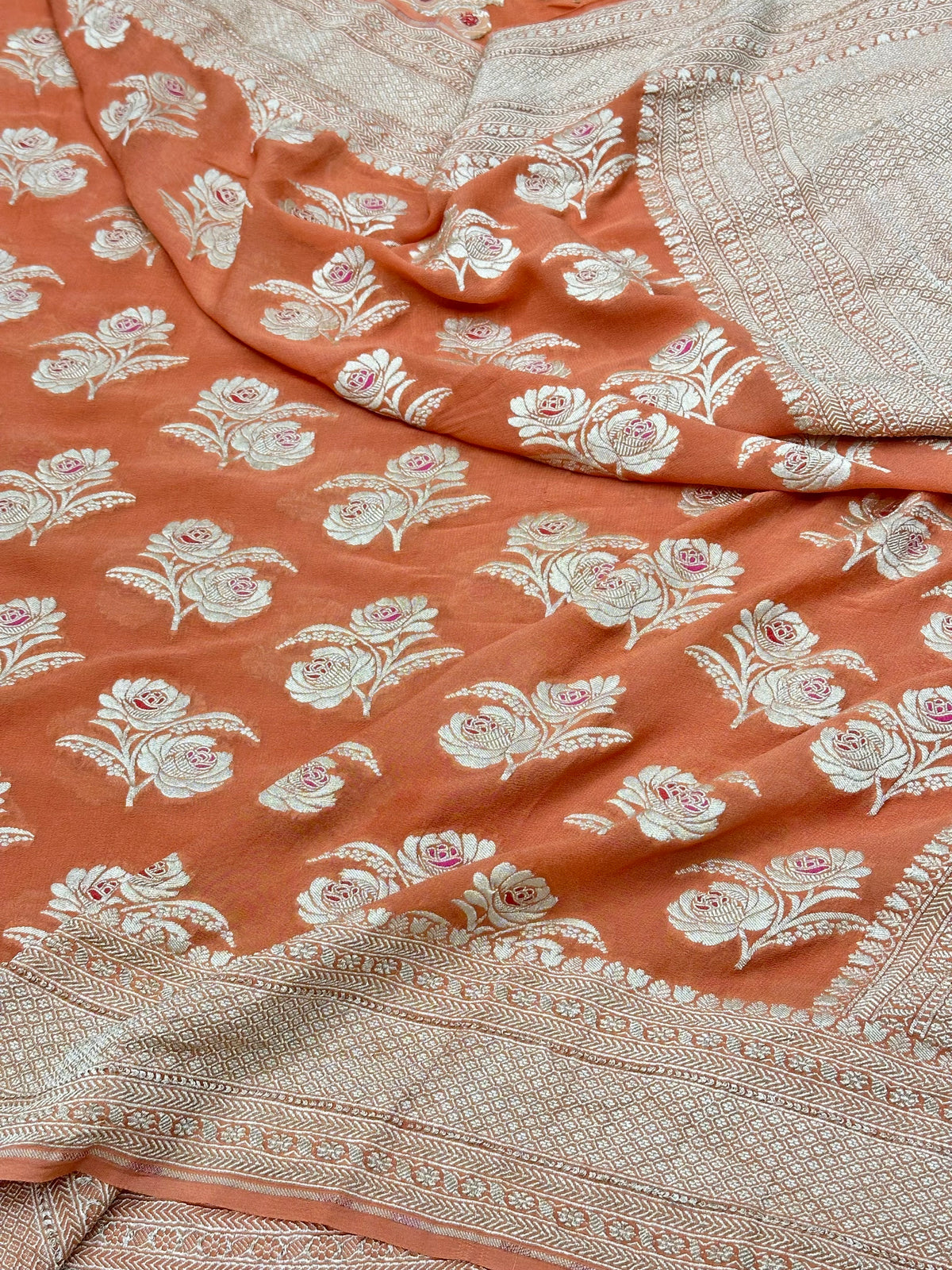 Orangish Peach Pure Banarasi Chiffon Georgette Cutwork weave dyeable Saree